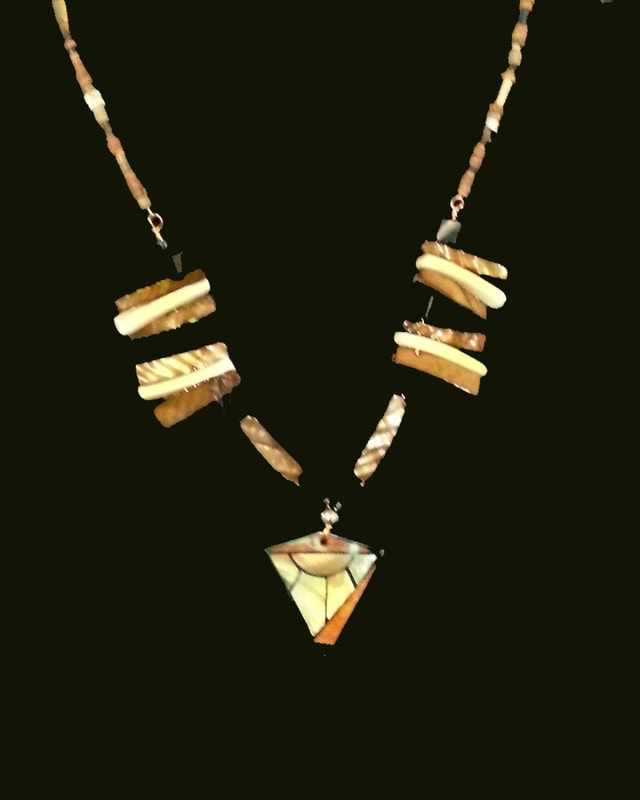 Pele Goddess Box Necklace, 3-D Constructions:   LA Levy creates artistic constructions using recycled materials, handmade papers, textiles, her artwork, photos, found objects and more.  When the inspiration strikes, she has to build it.
