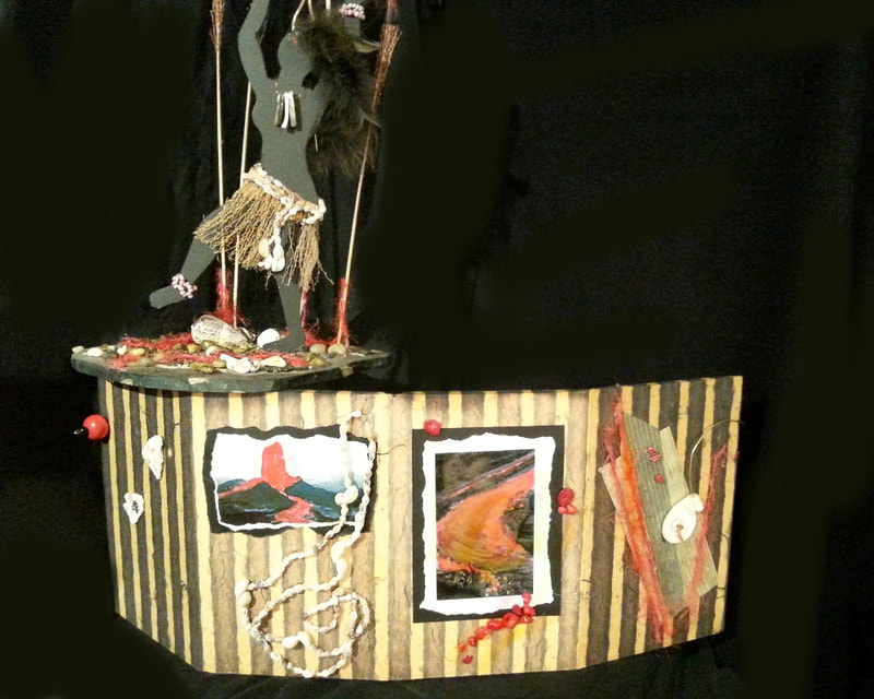 Pele Goddess Box, Outside, Opened, 3-D Constructions:   LA Levy creates artistic constructions using recycled materials, handmade papers, textiles, her artwork, photos, found objects and more.  When the inspiration strikes, she has to build it.